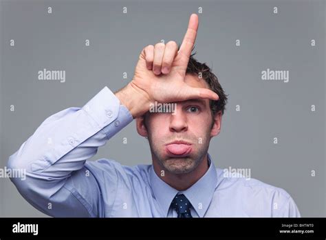 Loser hand gesture hi-res stock photography and images - Alamy