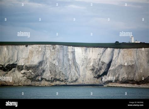 dover white cliffs lighthouse english channel Stock Photo - Alamy