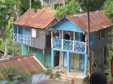 Two-story block and wood with balcony | Haiti, Haitian, Island house