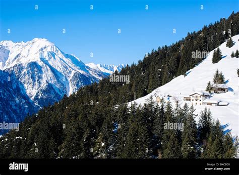 Swiss village in winter with lots of snow Stock Photo - Alamy