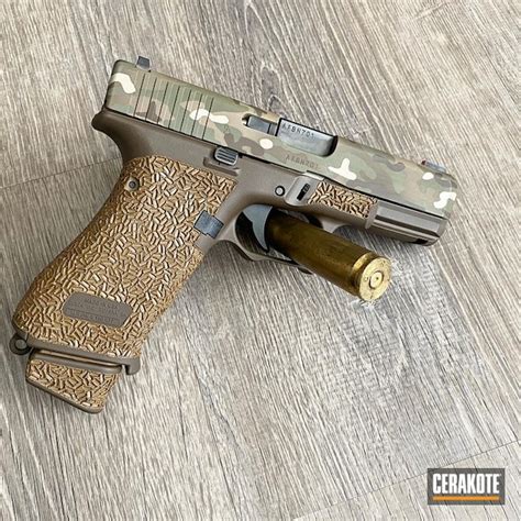 Multicam Glock 19X Pistol Cerakoted using Multicam® Pale Green, Chocolate Brown and Coyote Tan ...