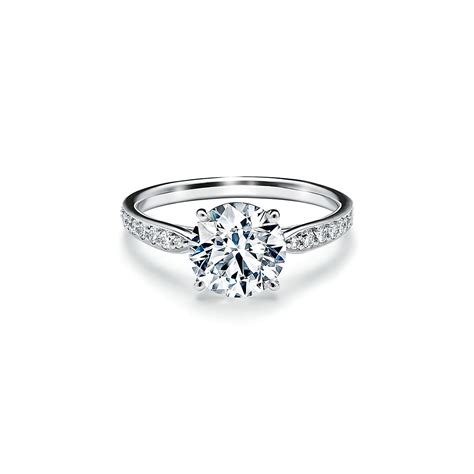 Tiffany Harmony™ engagement ring with a diamond band in platinum ...