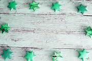 Photo of Green Christmas star border on rustic wood | Free christmas images