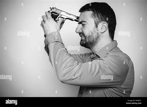 Sad man gun Black and White Stock Photos & Images - Alamy