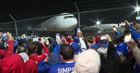 Buffalo Bills fans greet team at airport after comeback win over KC Chiefs