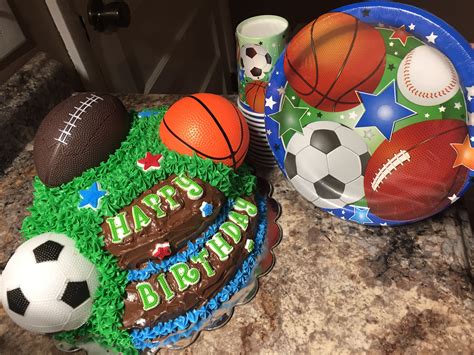 Sports themed cake, soccer, basketball, football, chocolate on chocolate, grass, two layers ...