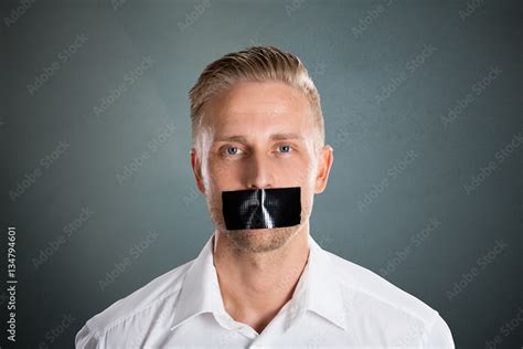 Man With Black Duct Tape Over His Mouth Stock Photo | Adobe Stock