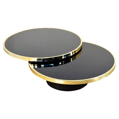 Design Institute of America Brass and Glass Swivel Cocktail Table | Black glass coffee table ...
