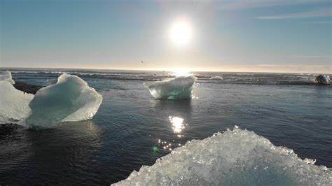 Sunrise at diamond beach, near jokulsarlon lagoon, Iceland 21379047 Stock Video at Vecteezy