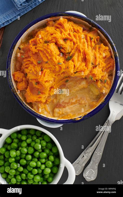 fish cottage pie with sweet potato mash Stock Photo - Alamy