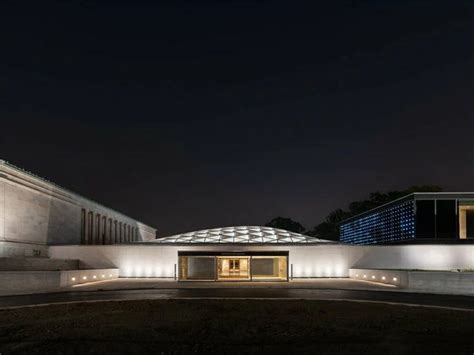 OMA's buffalo AKG art museum opens in new york, inviting the public under its transparent facade ...