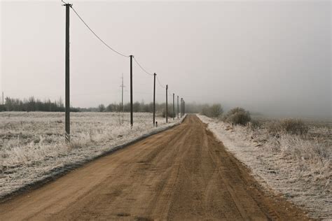 Brown Dirt Road Between Brown Grass Field · Free Stock Photo