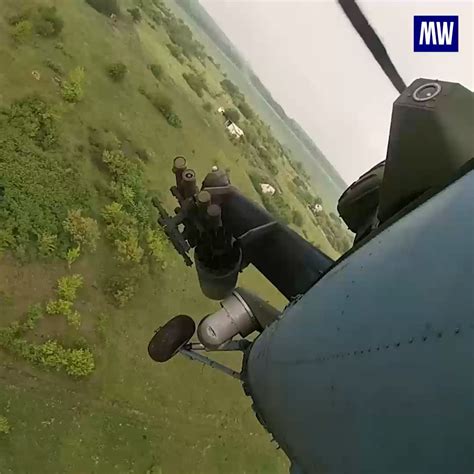 Mi-35 attack helicopter crew supporting Russian motorised rifle units ...