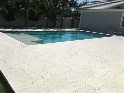 Pavers Around The Pool: How To Choose The Right Material