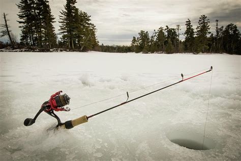 Wilderness Ice Fishing, Ely, Minnesota Photograph by Joel Sheagren - Fine Art America