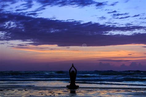 Silhouette Young Woman Doing Yoga on the Beach at Sunset Stock Photo - Image of body, peaceful ...