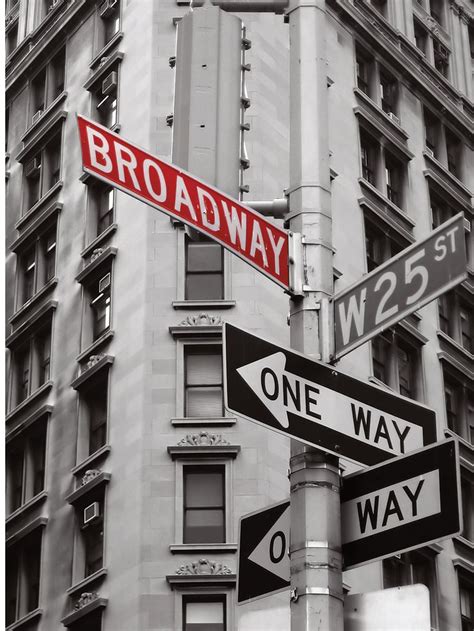 the street signs are clearly visible for all of us to see in black and ...