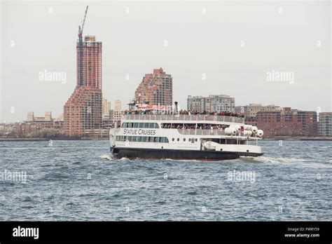 Statue Cruises passenger ferry taking tourists to the Statue of Liberty from Battery Park ,New ...