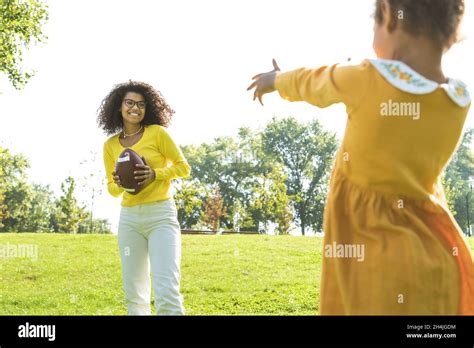 Beautiful happy african american family bonding at the park - Black ...