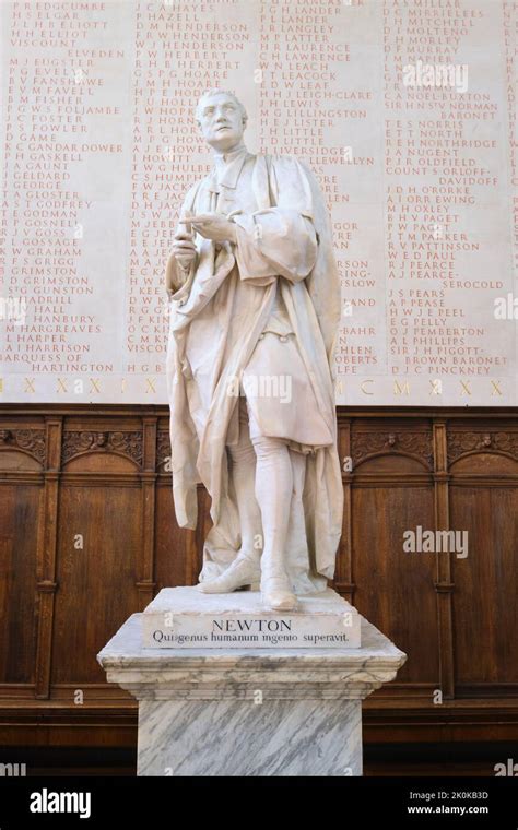 A white marble statue of Sir Isaac Newton, in the Trinity college ...