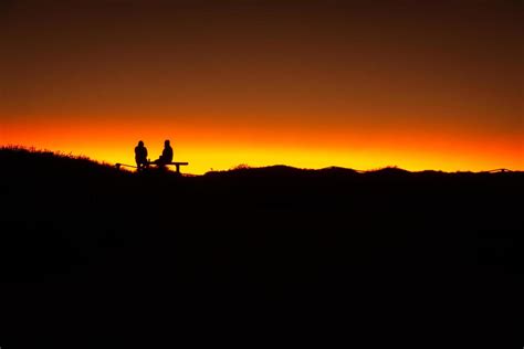 Silhouette couple at sunset 9214398 Stock Photo at Vecteezy