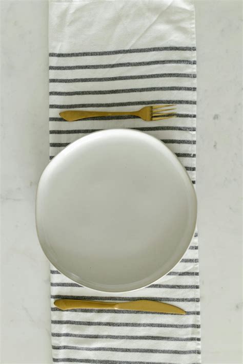 White Round Plate on White Table · Free Stock Photo