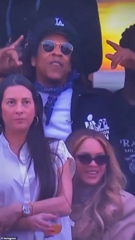 Beyoncé and Jay Z get into the Super Bowl spirit as they cheer on the Los ...