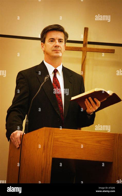 Pastor preaching from pulpit Stock Photo - Alamy