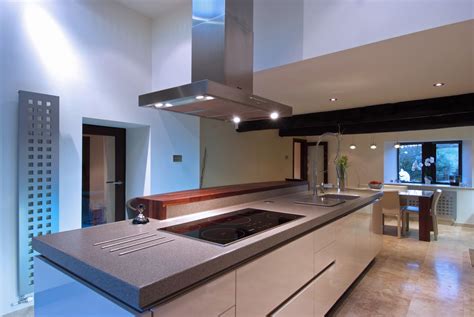 This Stuart Frazer SieMatic kitchen features a central island, with built in Miele hob and ...