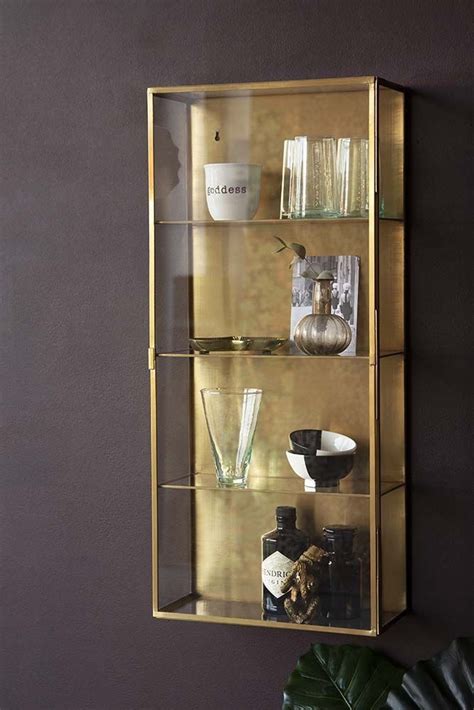 Glass and brass wall-mounted cabinet | Glass shelves in bathroom, Wall ...