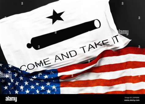 Flag of Texas Come and Take It along with a flag of the United States ...