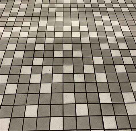 The tiles in my school’s locker room have no pattern to them whatsoever : r/notinteresting