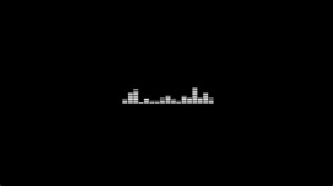 a black and white photo of a city skyline with buildings in the dark, as well as an equalizer ...