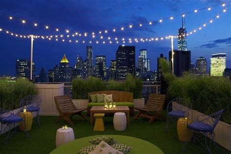 I'm pretty sure this deck has fake grass on it. | Rooftop patio design, Rooftop design, Rooftop ...