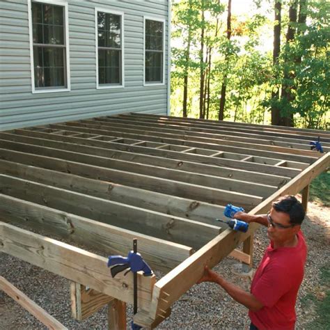 How to Build a Deck: Post Holes and Deck Framing in 2020 | Deck framing, Deck building plans ...