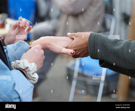 black and white holding hands Stock Photo - Alamy