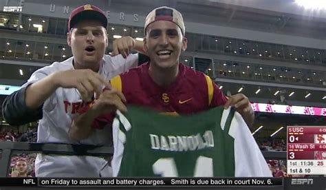 Fan shows off Sam Darnold Jets jersey at USC game