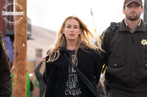 a police officer and a woman walking down the street