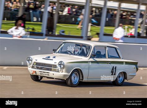 1964 Ford-Lotus Cortina Mk1 with driver Neil Brown, Sears Trophy race ...