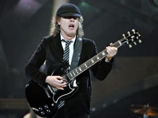 Angus Young biography, birth date, birth place and pictures