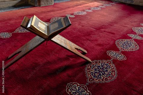 Islamic photo. The Holy Quran or Kuran-i Kerim on the lectern in a mosque Stock Photo | Adobe Stock