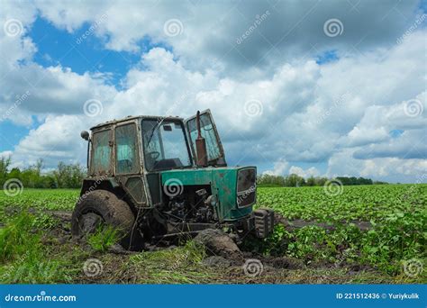 Farm Tractor Stuck in Field Dirt Stock Photo - Image of season, arable: 221512436