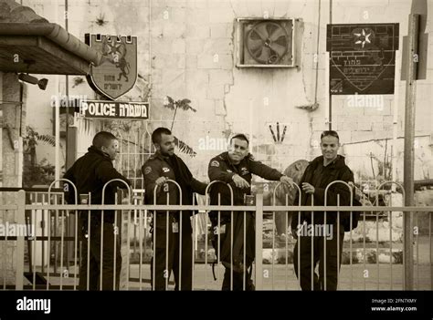 Jerusalem, Israel. Four police officers have coffee break at police ...