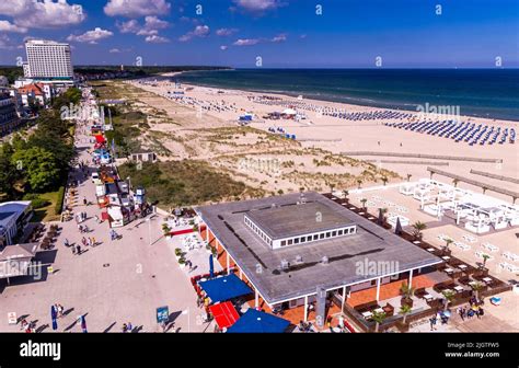 Rostock, Germany. 02nd July, 2022. Beach promenade, bathing beach and in the background the ...