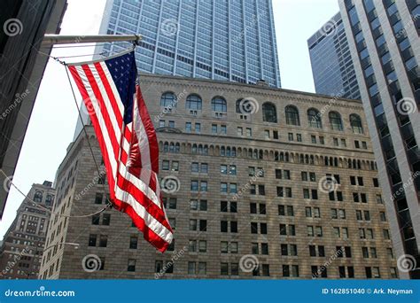 US Flag On The Background Of The Federal Reserve Building In New York ...