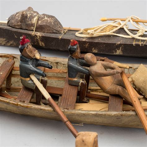 AN UMIAK AND THREE KAJAKS, MODEL BOATS GREENLAND, WITH FIGURES, PADDLES, SPEERS ETC. - Bukowskis