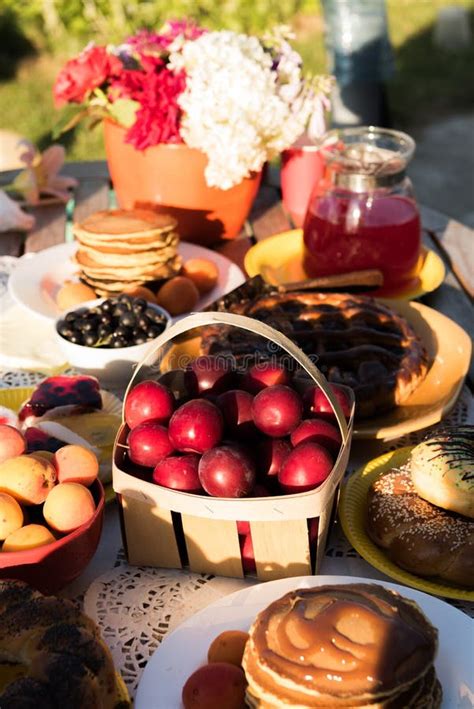 Picnic in the Backyard on a Sunny Day Stock Image - Image of cakes, juice: 75841767