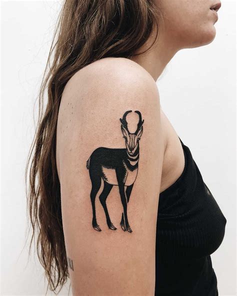 Black and white gazelle tattoo on the right upper arm | Tattoos ...