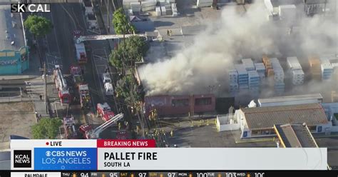 Pallet fire breaks out inside commercial building in South LA - CBS Los ...