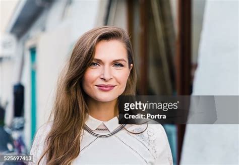 Beautiful Woman Smiling Outdoors High-Res Stock Photo - Getty Images